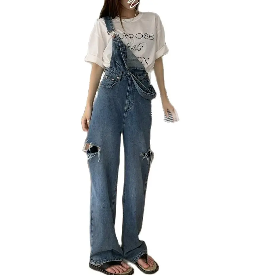 Nauji atvykėliai 2023 Medvilninis moteriškas džinsinis kombinezonas Didelė skylė ties šlaunimis Minkštas drabužis Skalbti ilgi džinsai Bendras dizainas