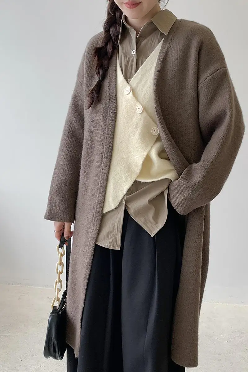 Vidutinio ilgio megztinis paltas Korėjietiško stiliaus tingus stilius aukštos klasės plonas prancūzų mada retro iki kelių laisvas sustorėjęs megztas paltas prašmatnus